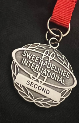 Image of 2nd place Sweet Adelines medal